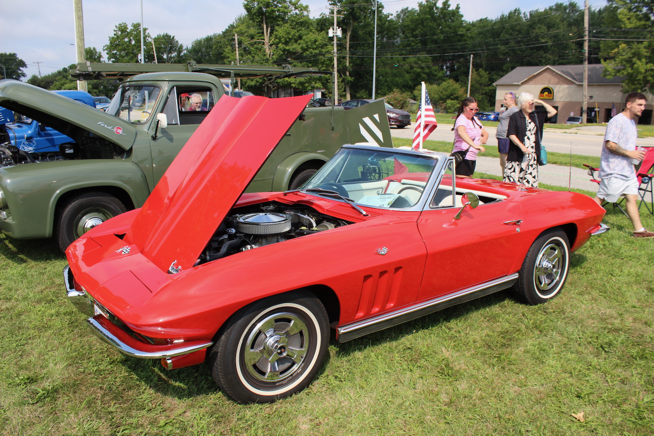1960s Chevrolet Corvette convertible, red, hood open side view