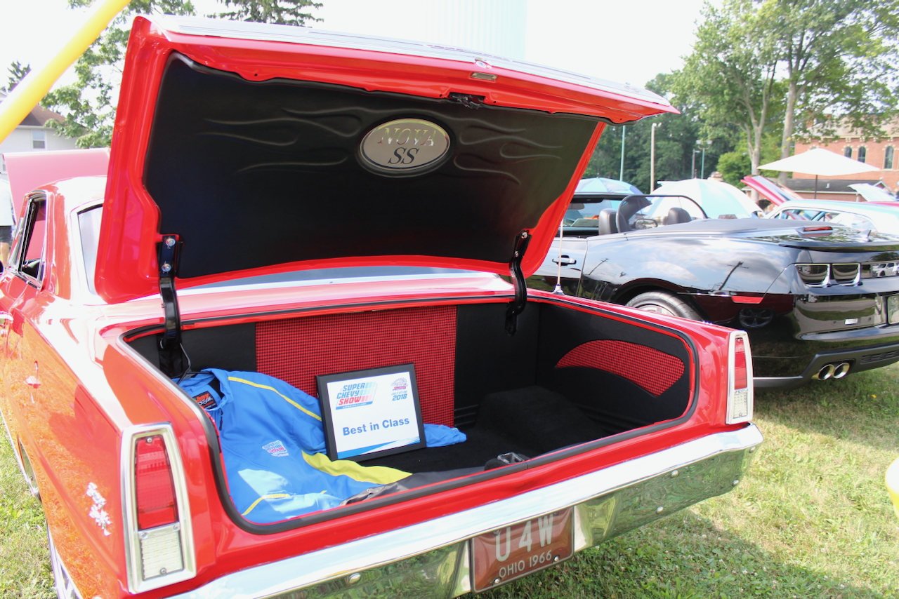 1960s Chevrolet Nova SS, red, open trunk award display