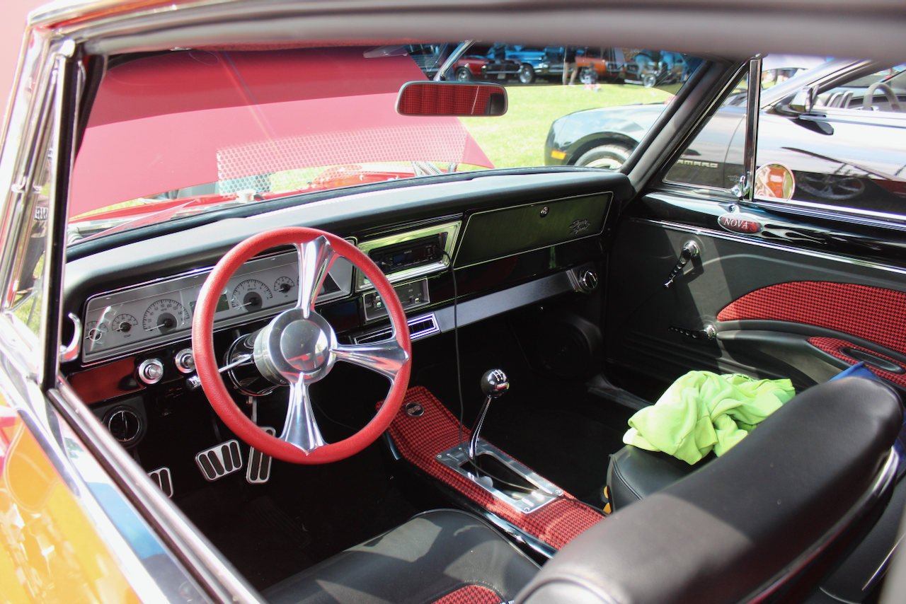 1960s Chevrolet Nova SS, red and black interior, dashboard and steering wheel view