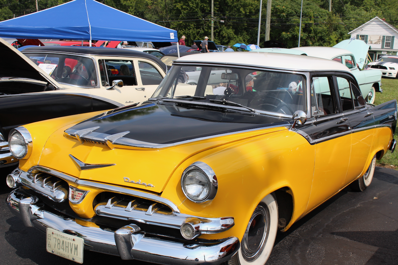 1960s Dodge station wagon, yellow and black, front three-quarter view