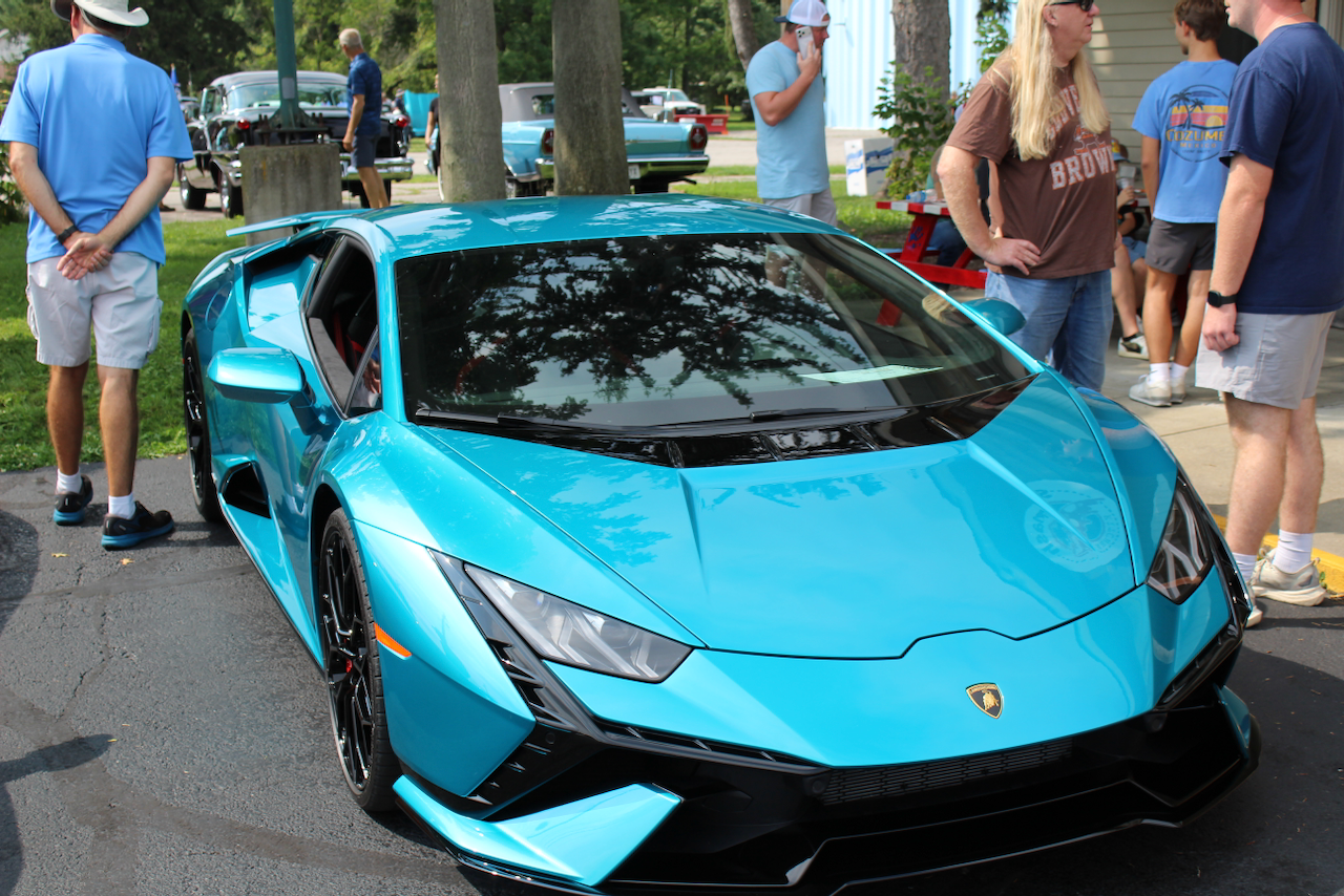 2020s Lamborghini Huracan, turquoise, front three-quarter view