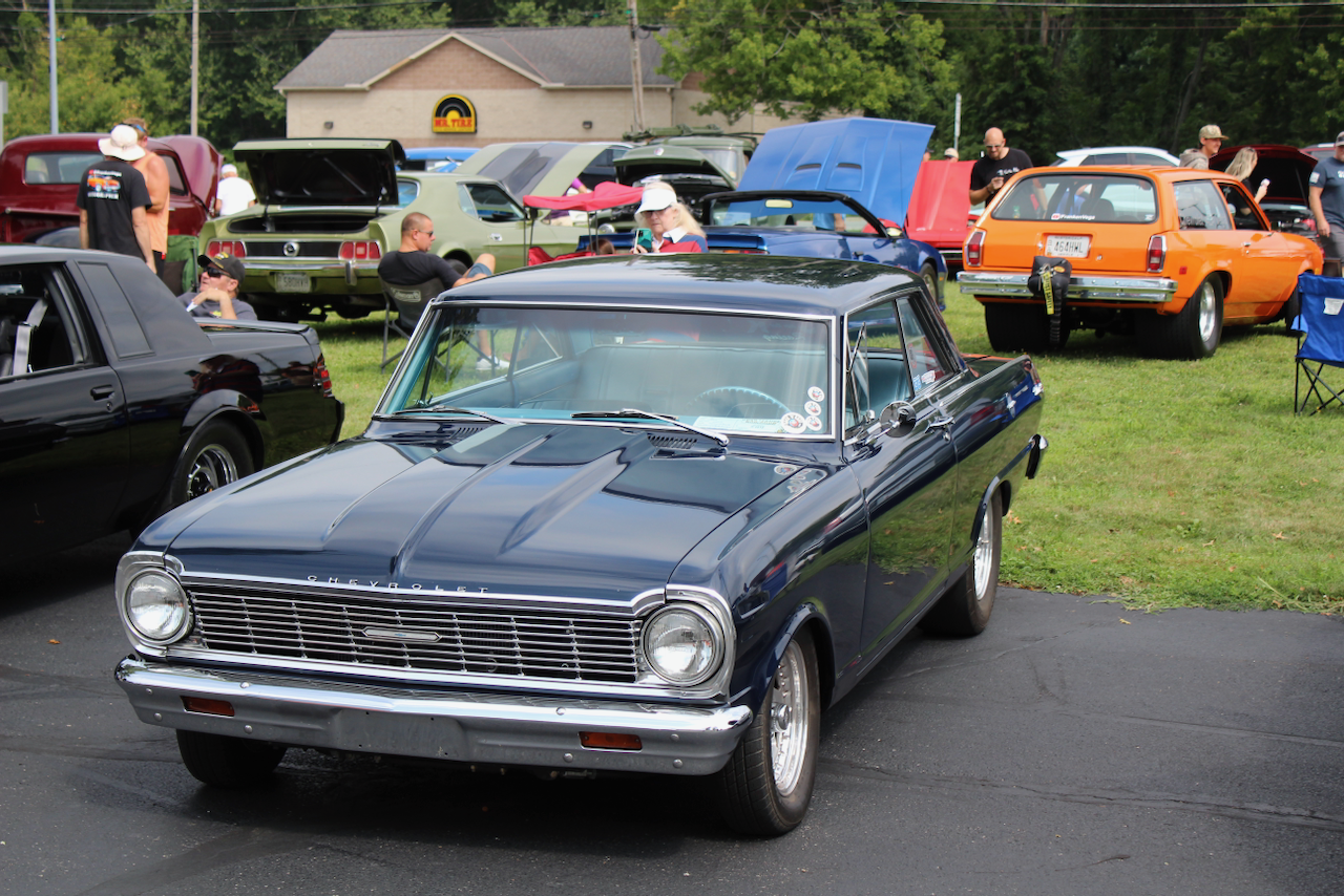 1960s Chevrolet Nova, dark blue, front three-quarter view