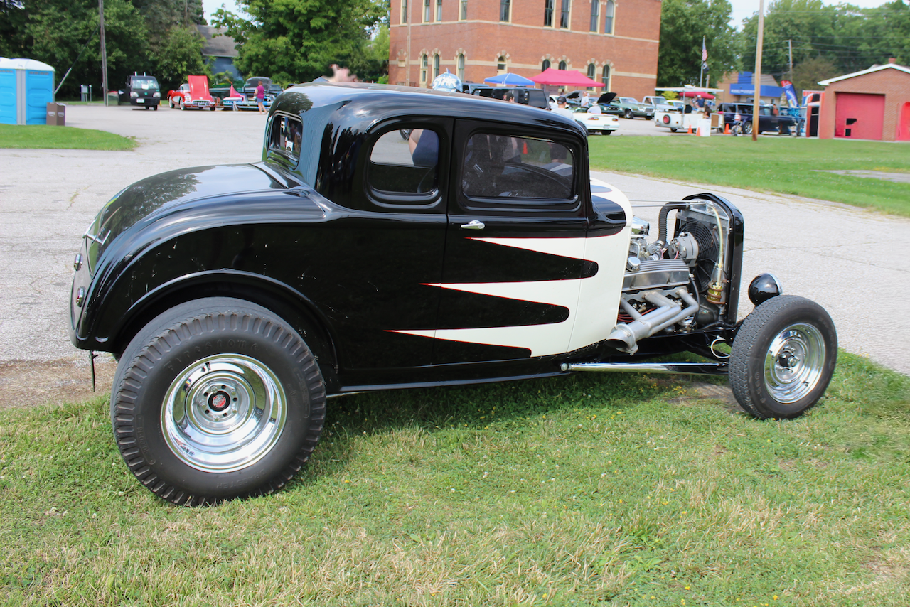 1930s hot rod coupe, black and white, side profile view